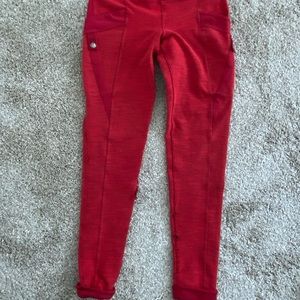 Lululemon, folded bottom leggings w/ pocket and holes